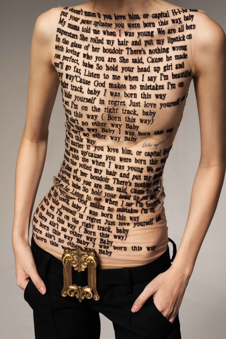 V NECK TOP WITH KNOT BACK TALES OF TATTOO